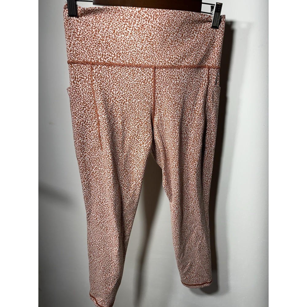 Athleta Salutation Stash Pocket Leggings Ocelot Spot Orange Women's Sz Medium